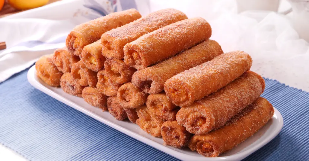 En esta receta te vamos a explicar como hacer estos exquisitos enrollados rellenos de crema que son ideales para compartir en una reunión